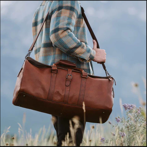 Leather Duffle Bag in Her Wardrobe