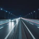 Raised pavement markers on a highway at night