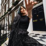 Patient consulting with dentist in large corporate dental clinic discussing treatment options and costs